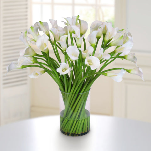 CALLA LILY IN CLEAR CYLINDER VASE #1083.WW00